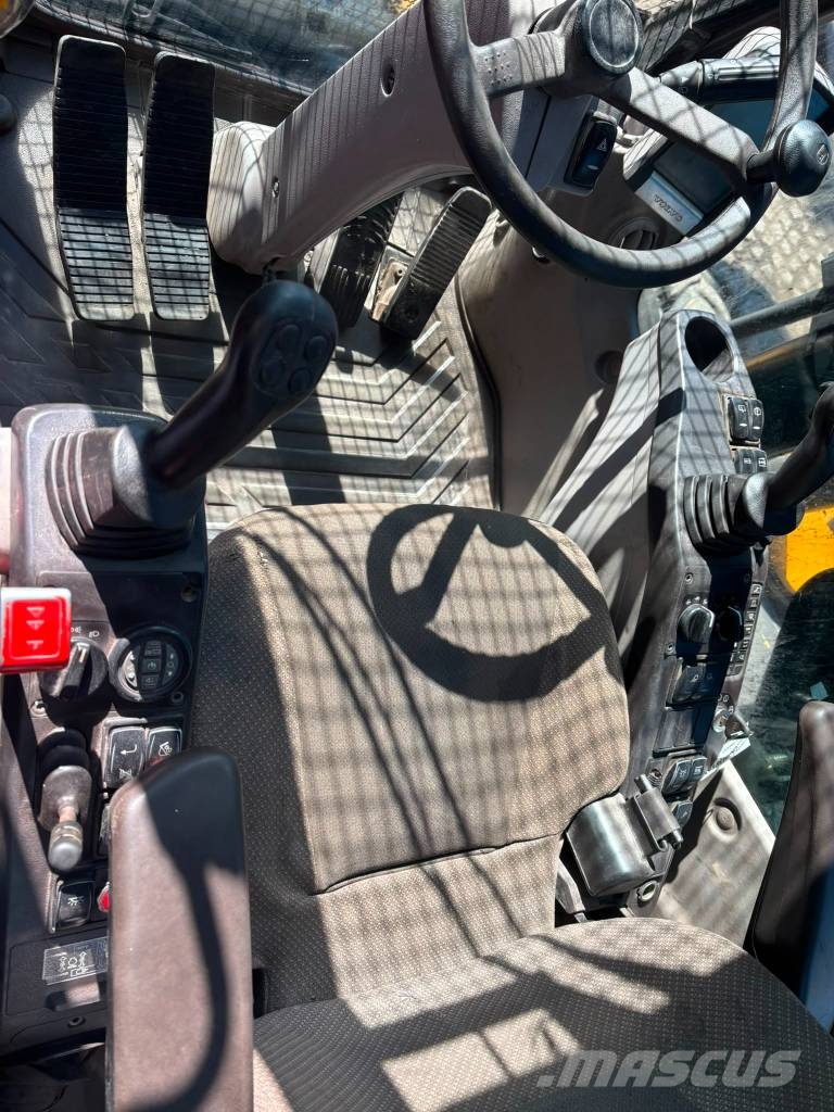 Volvo EW 210 C Bagri na kolesih
