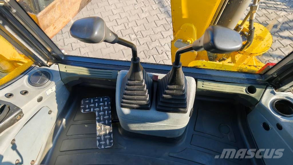New Holland B 115 TLB's