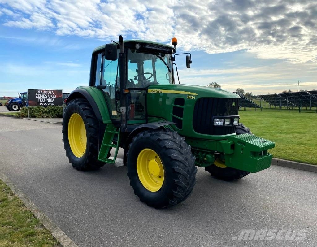 John Deere 6534 الجرارات