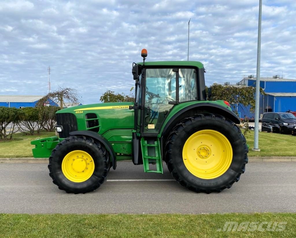 John Deere 6534 الجرارات