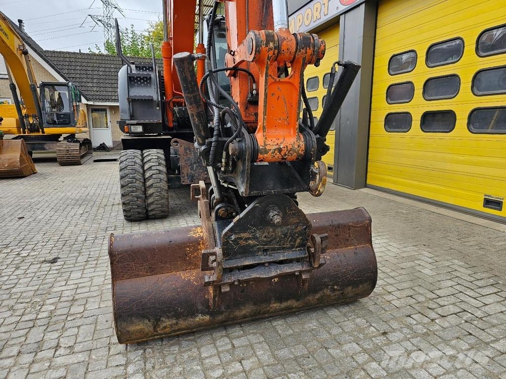 Hitachi ZX140W-3 حفارات بعجل