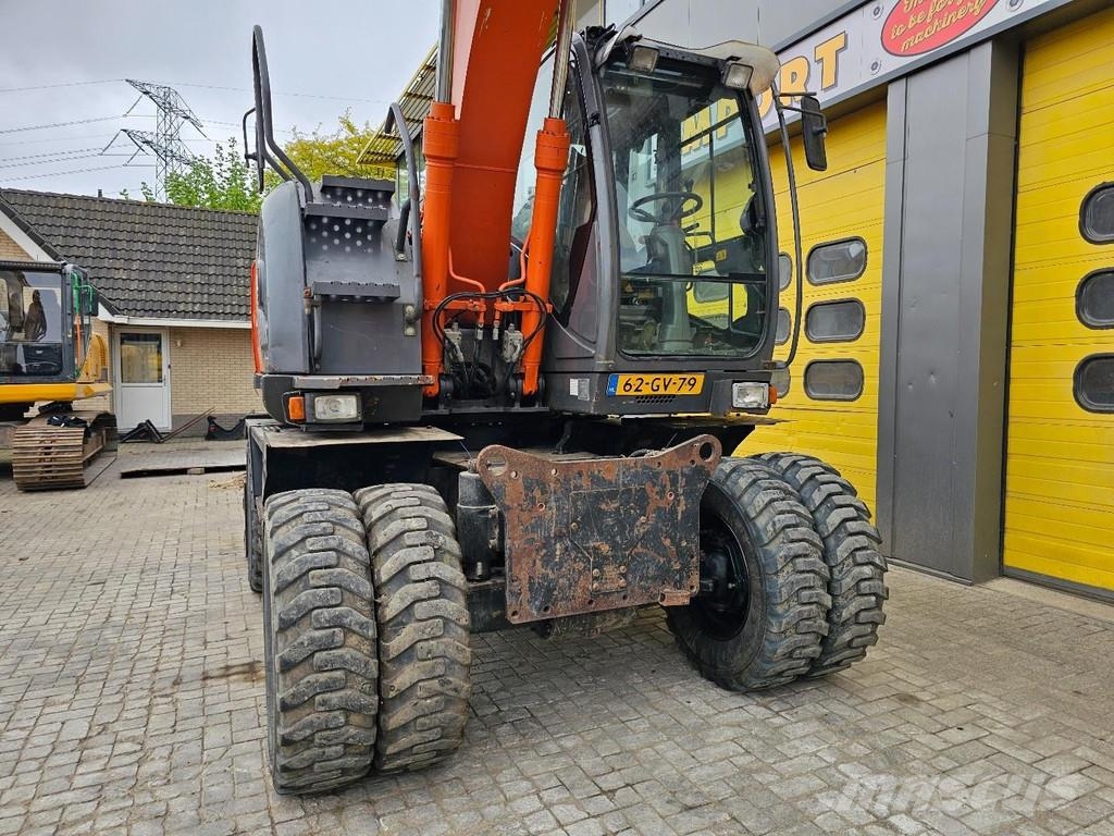 Hitachi ZX140W-3 حفارات بعجل