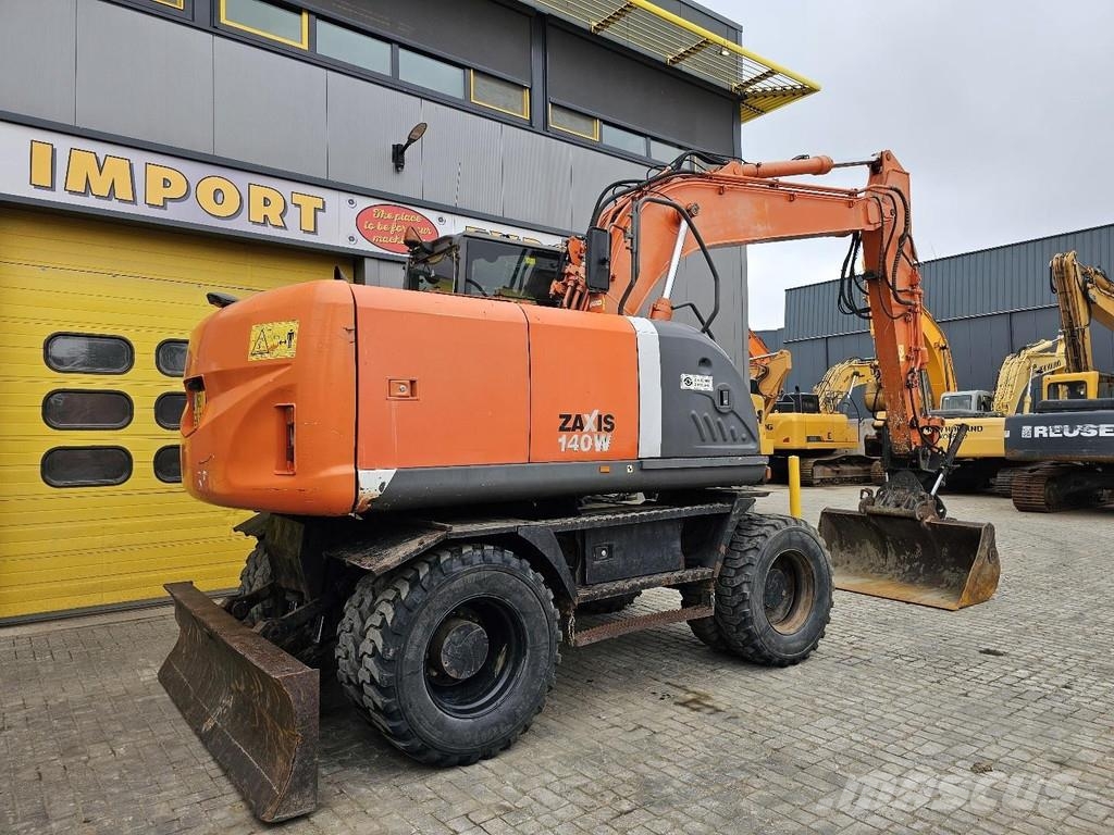 Hitachi ZX140W-3 حفارات بعجل