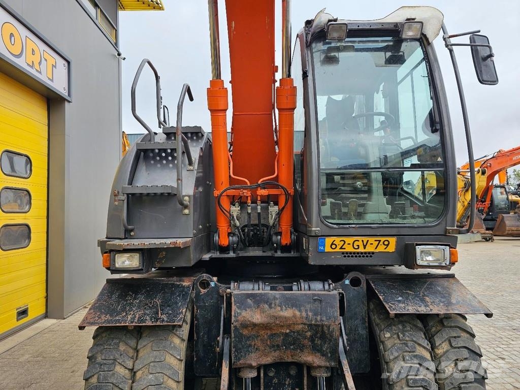 Hitachi ZX140W-3 حفارات بعجل
