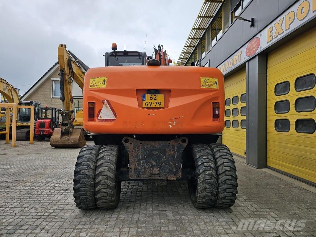 Hitachi ZX140W-3 حفارات بعجل
