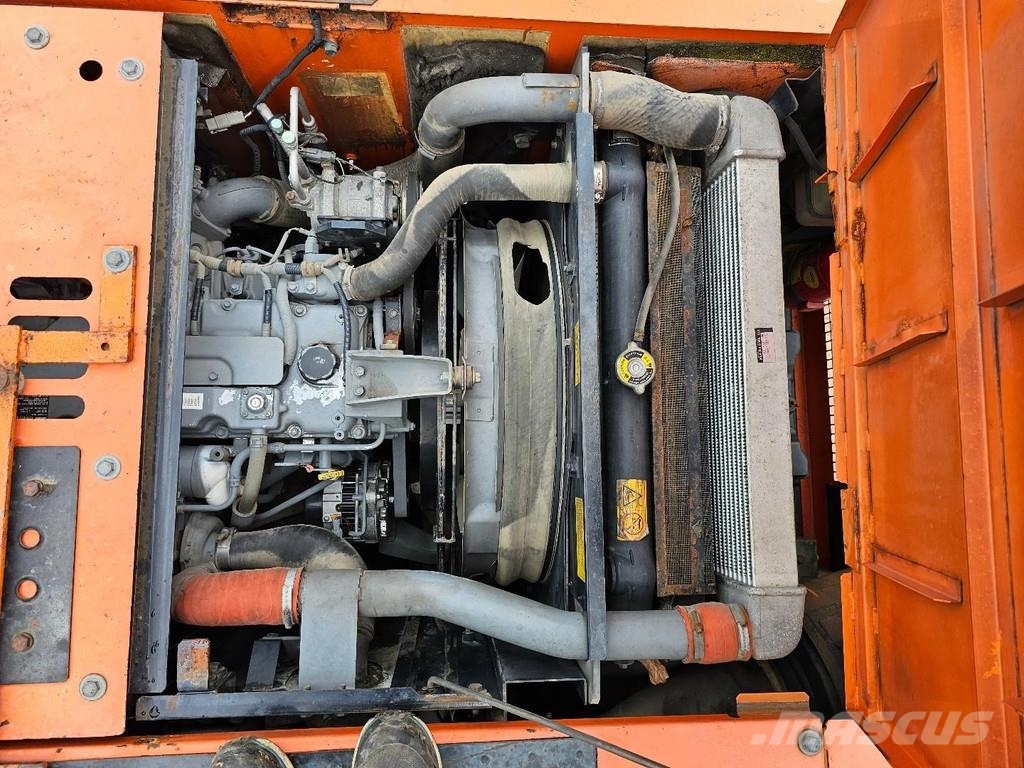 Hitachi ZX140W-3 حفارات بعجل