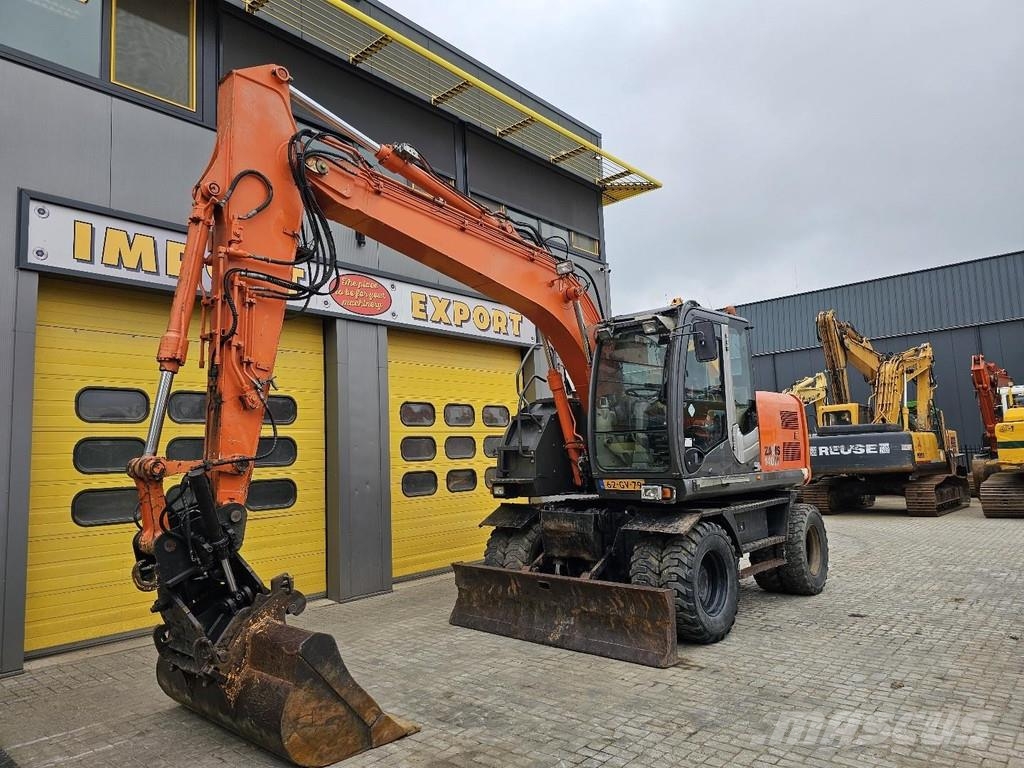 Hitachi ZX140W-3 حفارات بعجل
