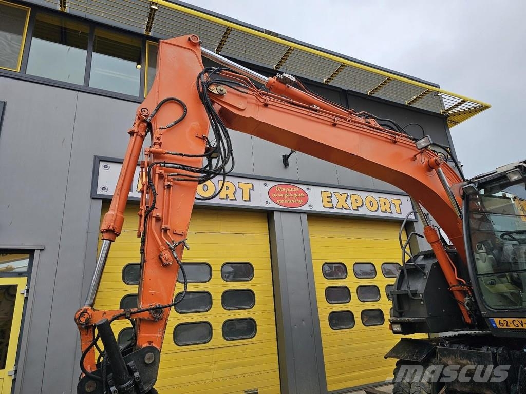 Hitachi ZX140W-3 حفارات بعجل