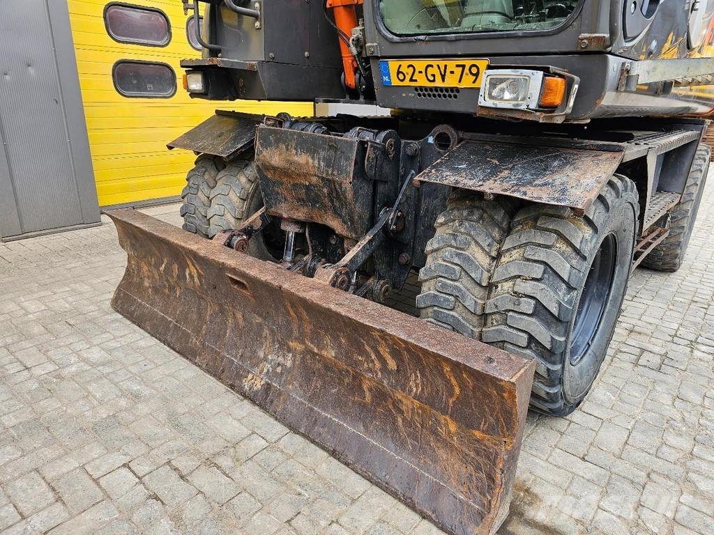 Hitachi ZX140W-3 حفارات بعجل
