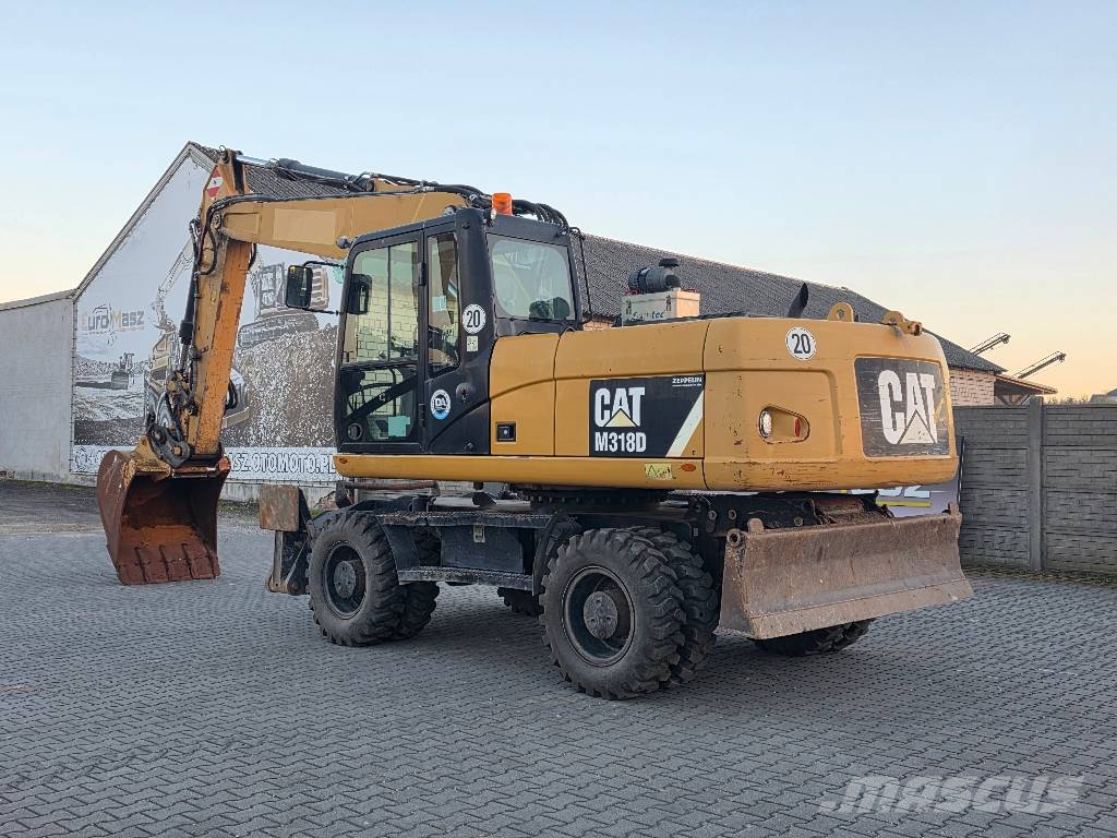 CAT M318D, 2014 ROK, PODPORY + PŁUG Ratasekskavaatorid