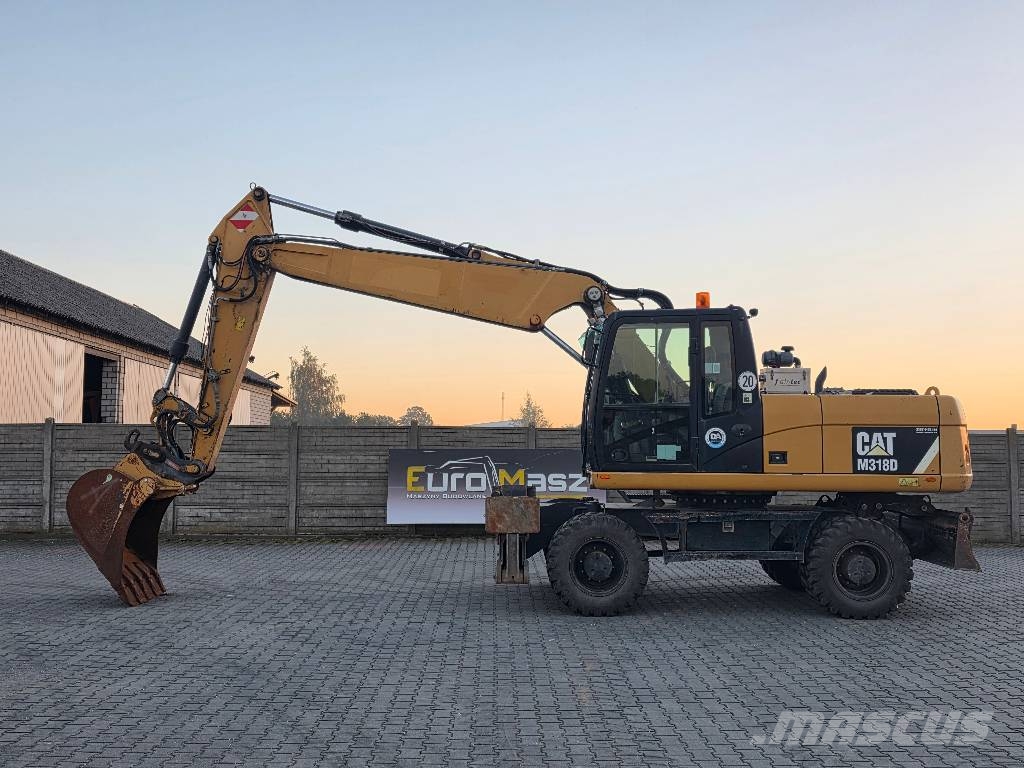 CAT M318D, 2014 ROK, PODPORY + PŁUG Ratasekskavaatorid