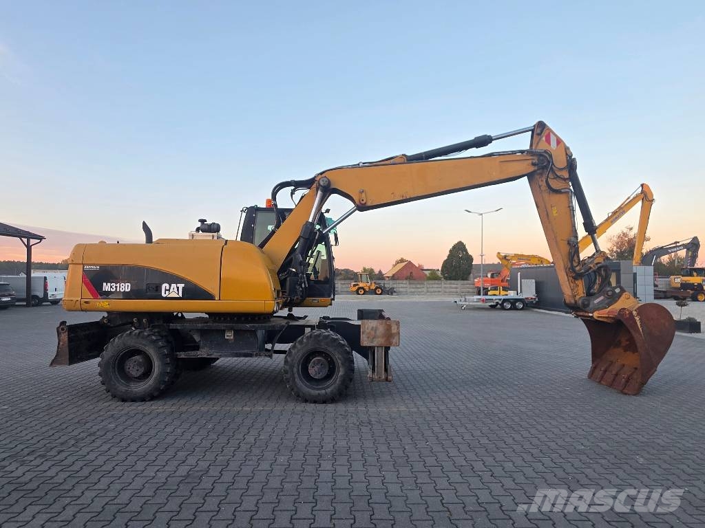 CAT M318D, 2014 ROK, PODPORY + PŁUG Ratasekskavaatorid