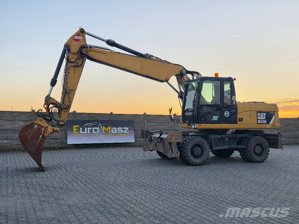 CAT M318D, 2014 ROK, PODPORY + PŁUG Ratasekskavaatorid
