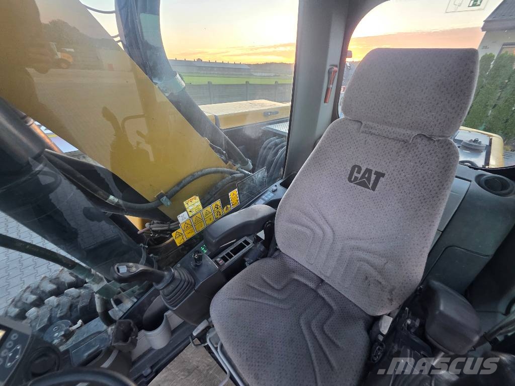 CAT M318D, 2014 ROK, PODPORY + PŁUG Ratasekskavaatorid