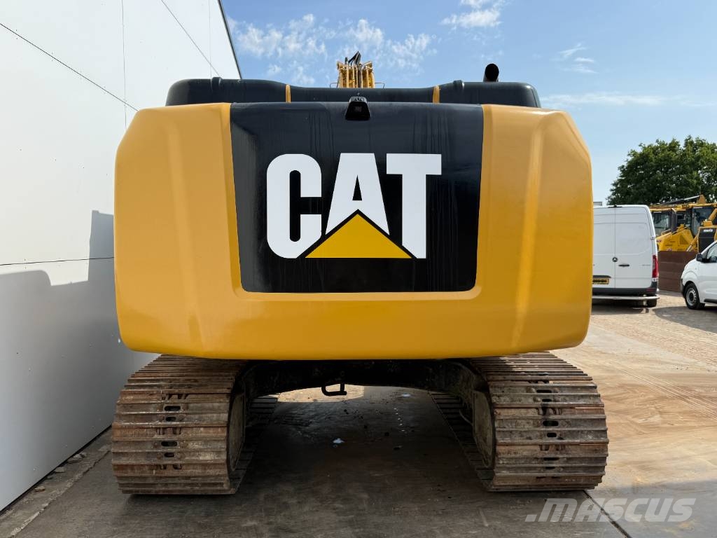 CAT 323FL - Hammer Lines / Quick Coupler Roomikekskavaatorid