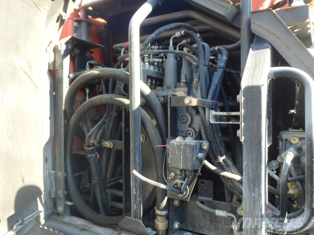 Hitachi ZX 140 W-3 kallistajalla 휠 굴삭기