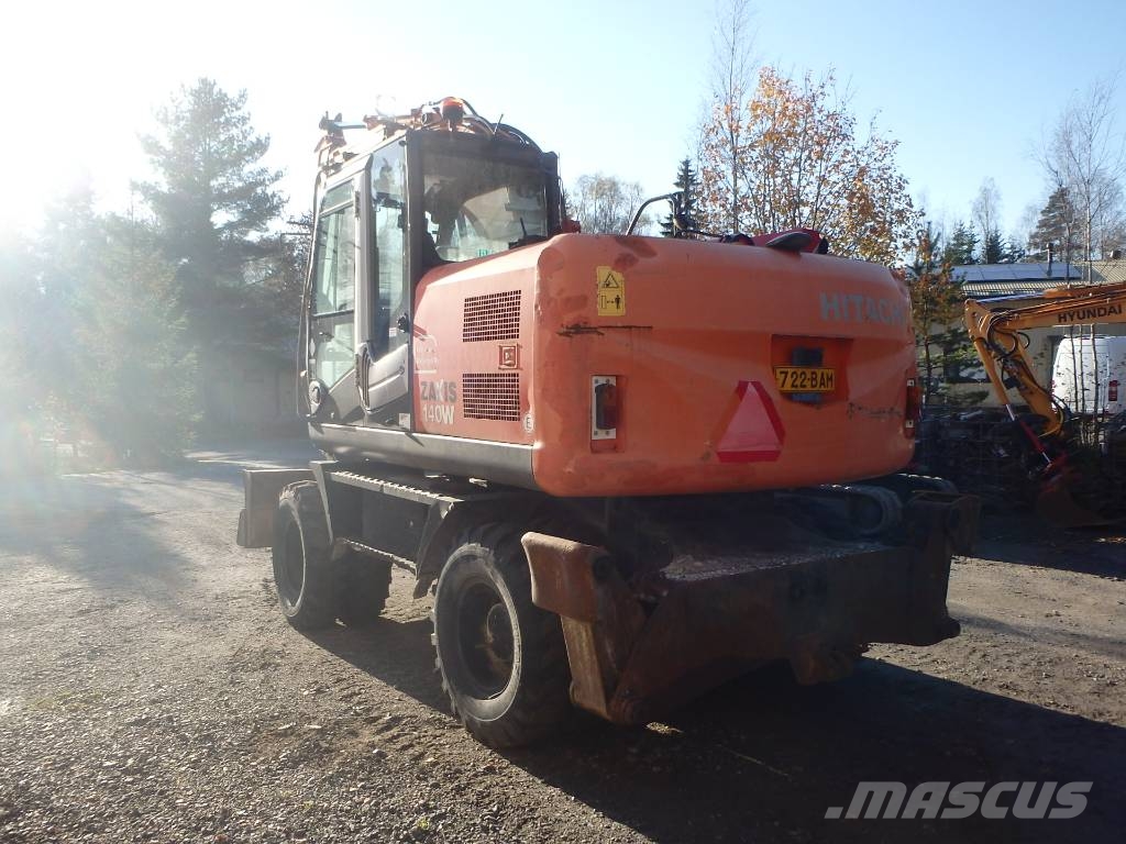 Hitachi ZX 140 W-3 kallistajalla 휠 굴삭기