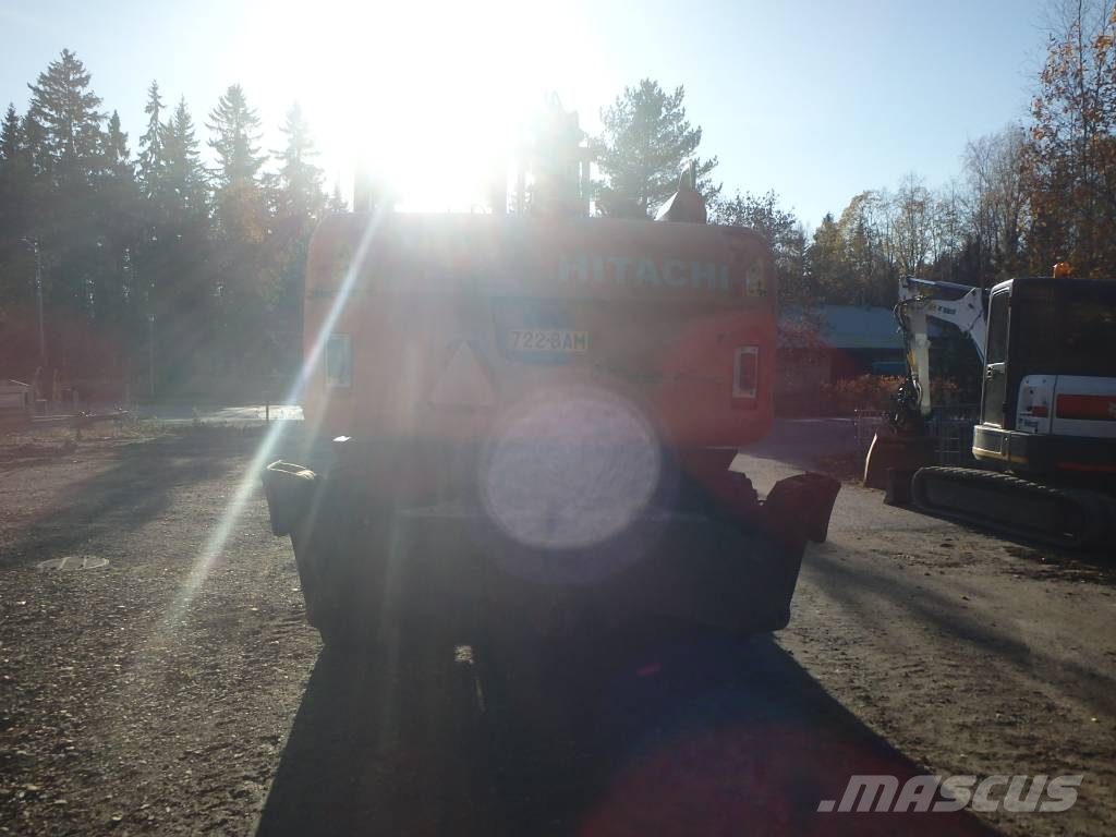 Hitachi ZX 140 W-3 kallistajalla 휠 굴삭기