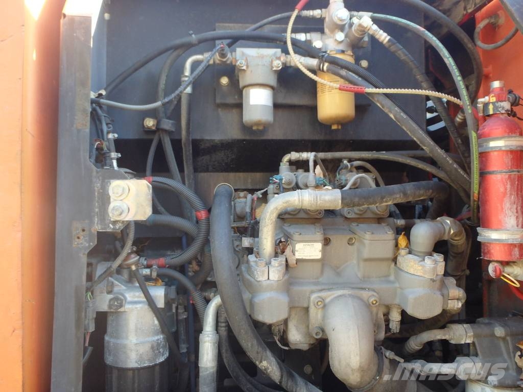 Hitachi ZX 140 W-3 kallistajalla 휠 굴삭기