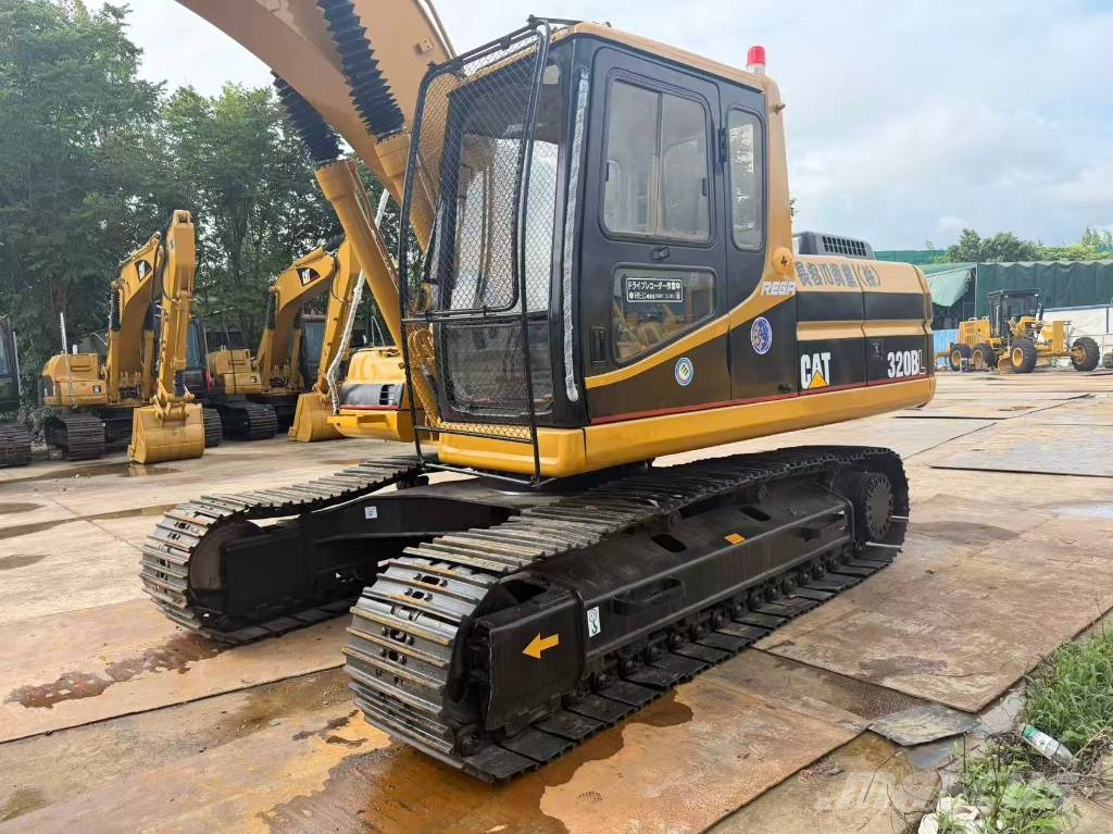 CAT 320 Bagri goseničarji