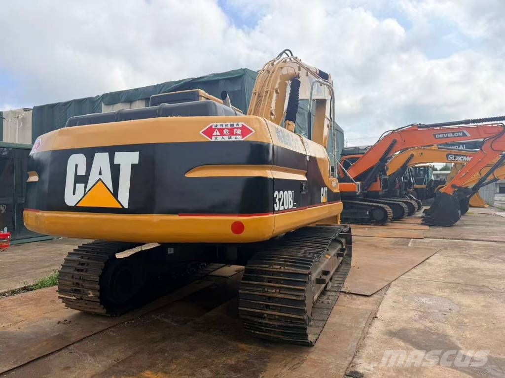 CAT 320 Bagri goseničarji