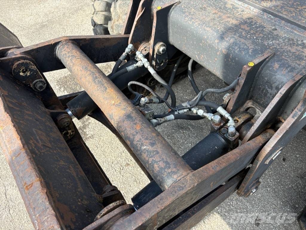 CAT M 312 Bagri na kolesih