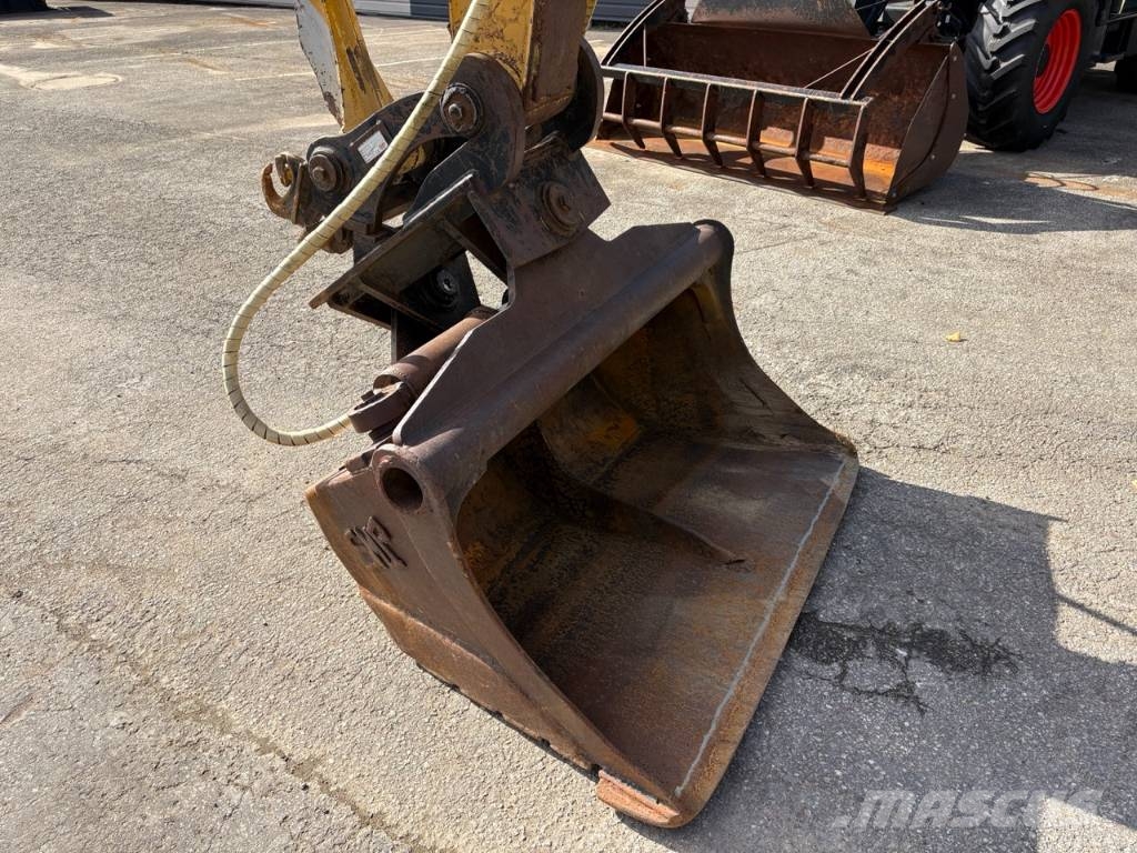 CAT M 312 Bagri na kolesih
