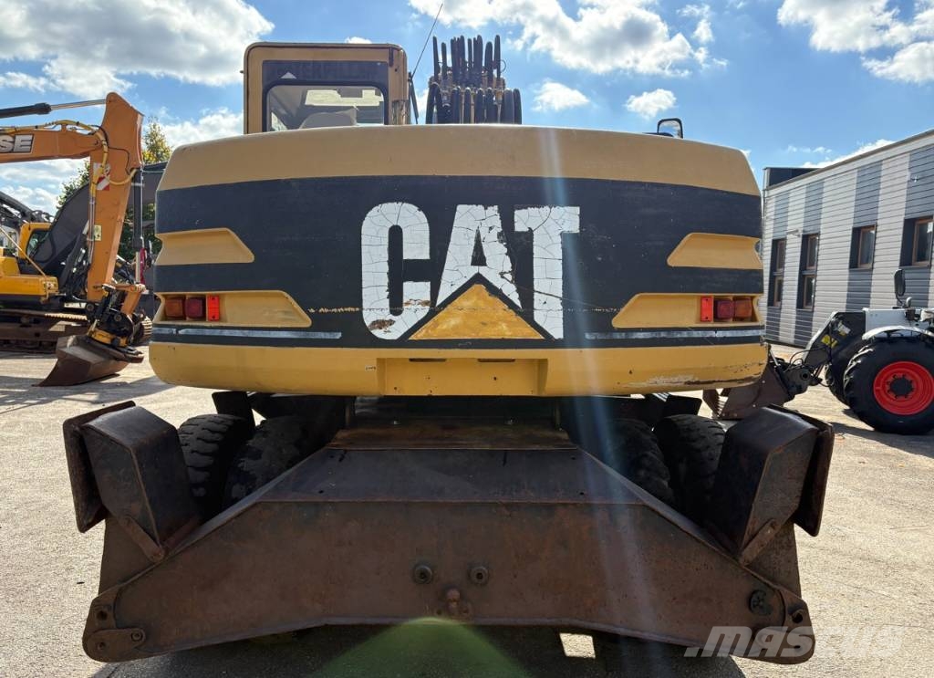 CAT M 312 Bagri na kolesih