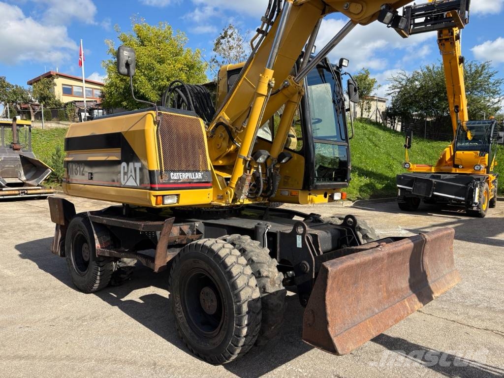 CAT M 312 Bagri na kolesih