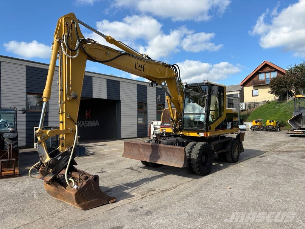 CAT M 312 Bagri na kolesih