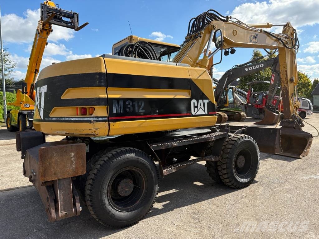 CAT M 312 Bagri na kolesih