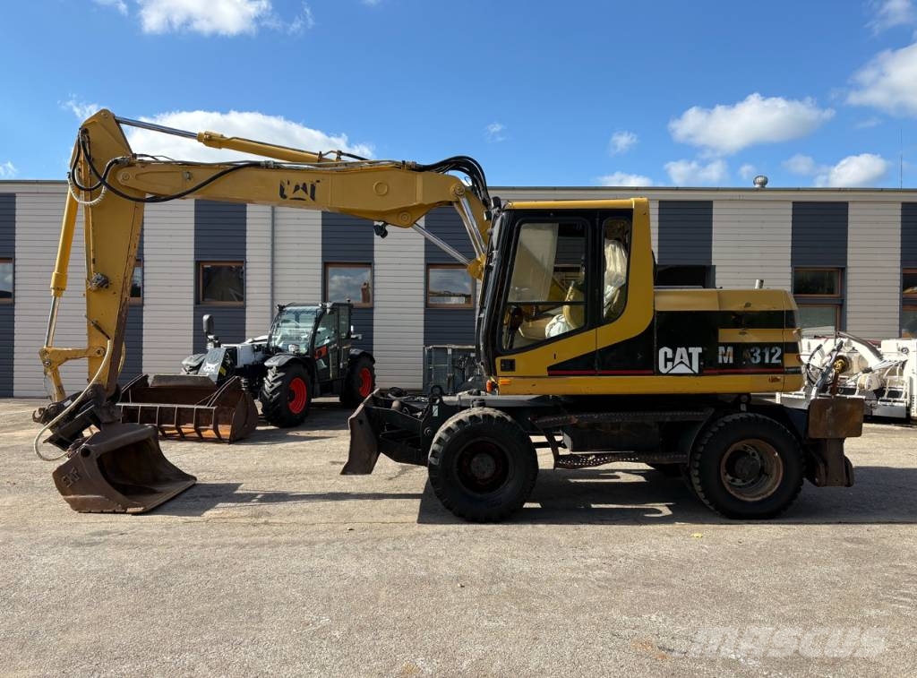 CAT M 312 Bagri na kolesih