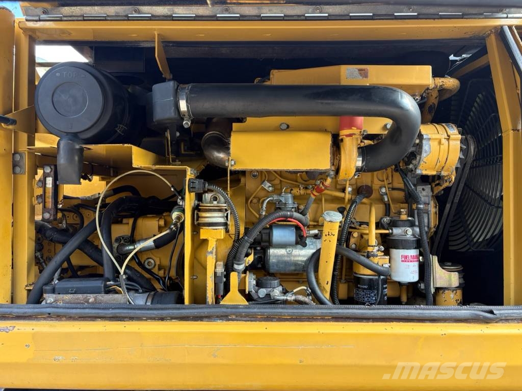 CAT M 312 Bagri na kolesih