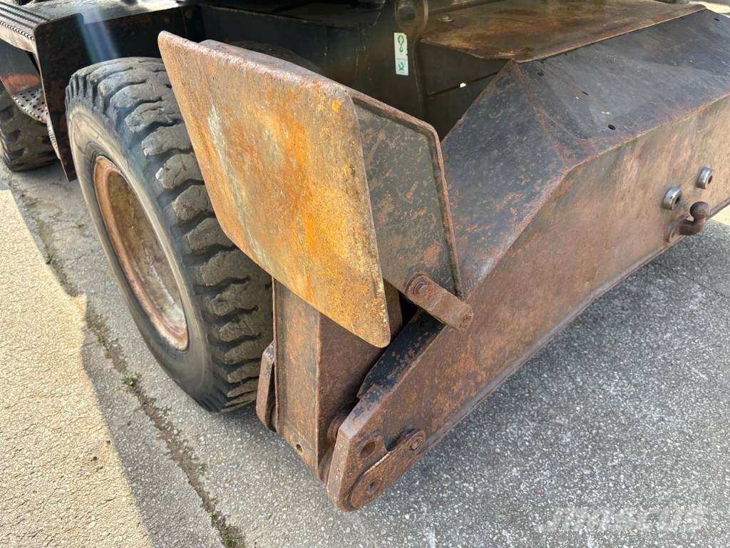 CAT M 312 Bagri na kolesih