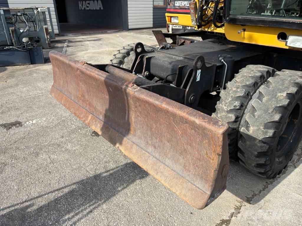 CAT M 312 Bagri na kolesih