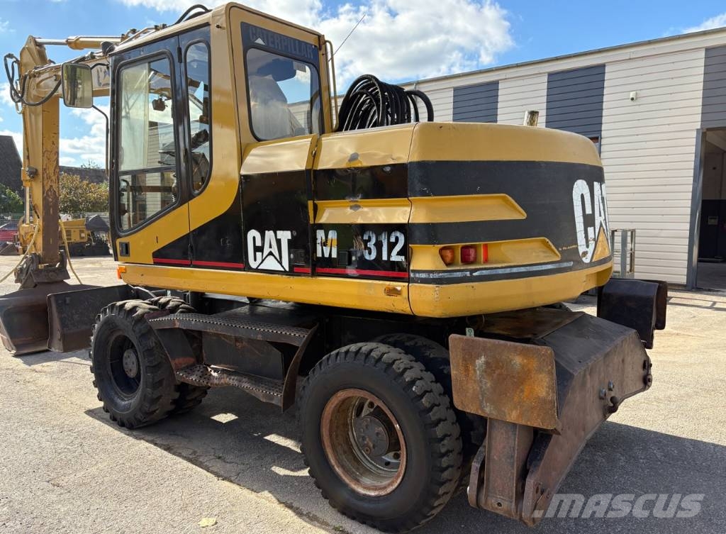 CAT M 312 Bagri na kolesih