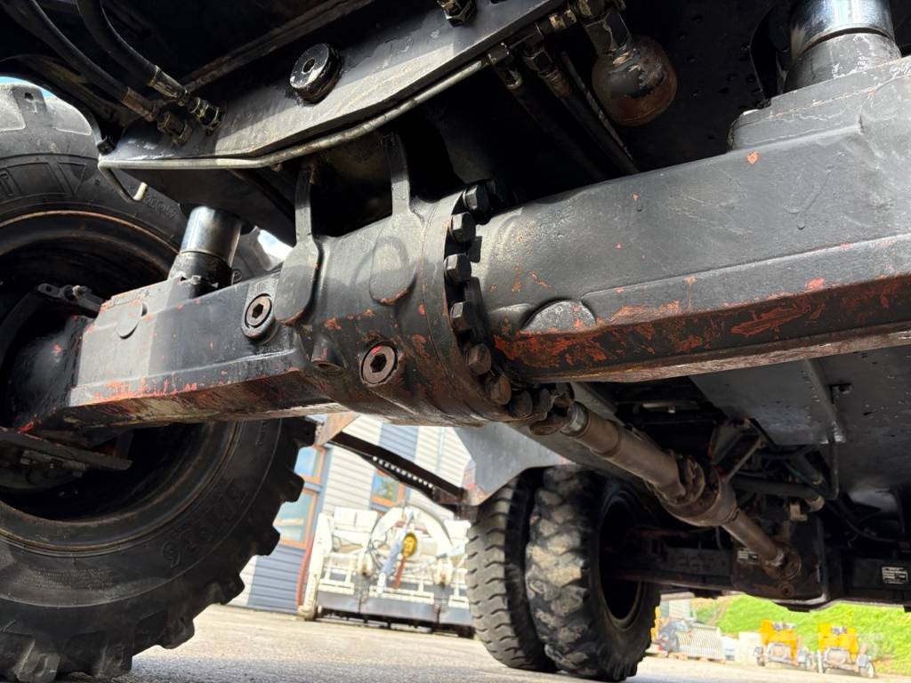 CAT M 312 Bagri na kolesih