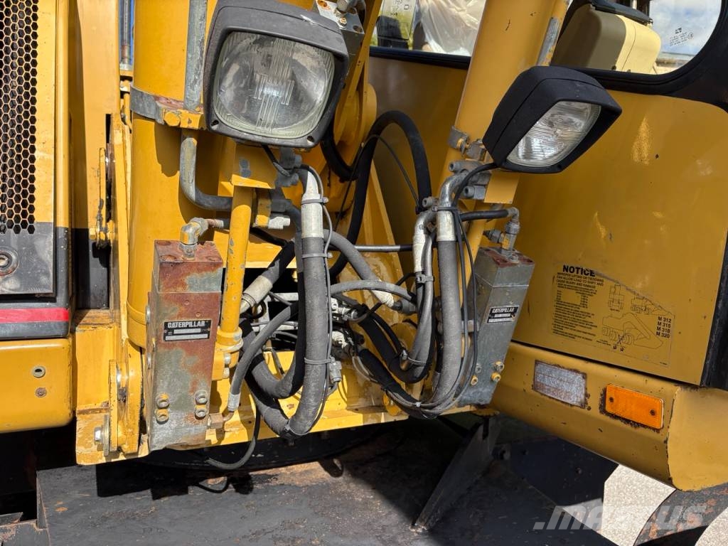 CAT M 312 Bagri na kolesih