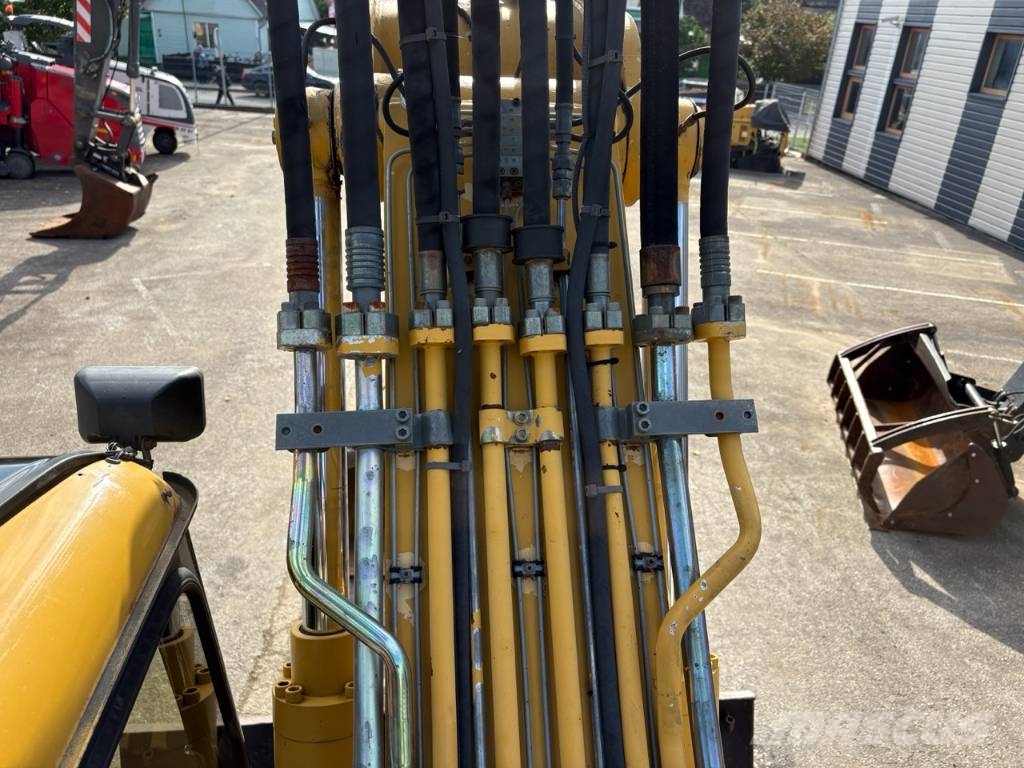 CAT M 312 Bagri na kolesih