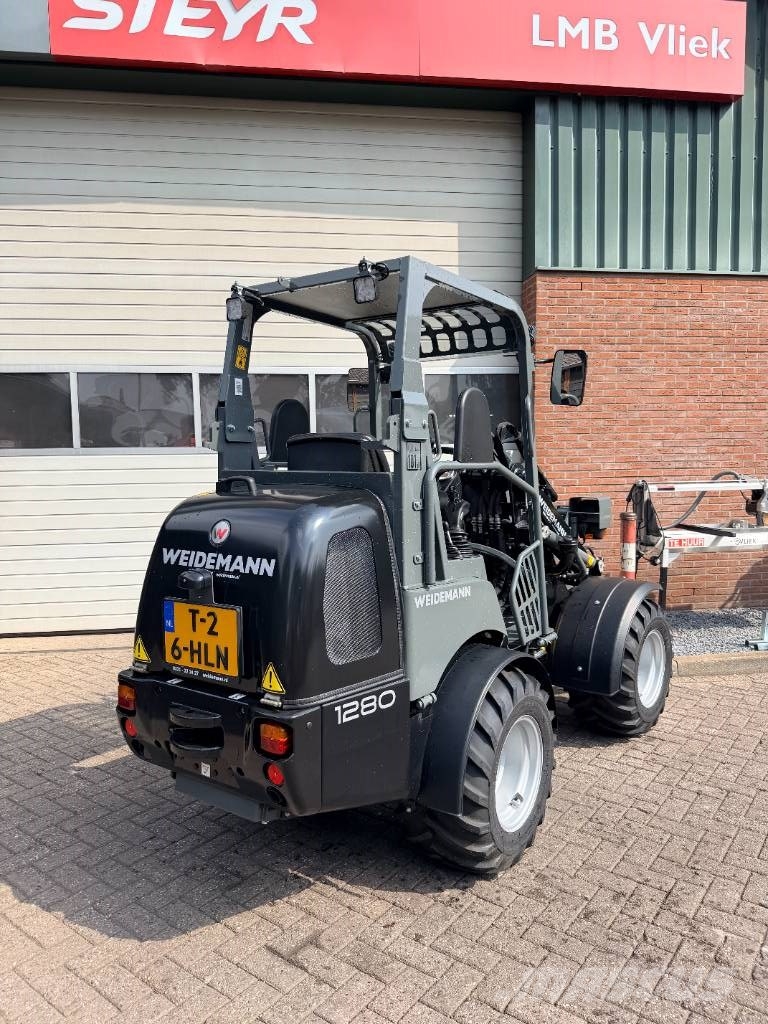 Weidemann 1280 لوادر صغيرة