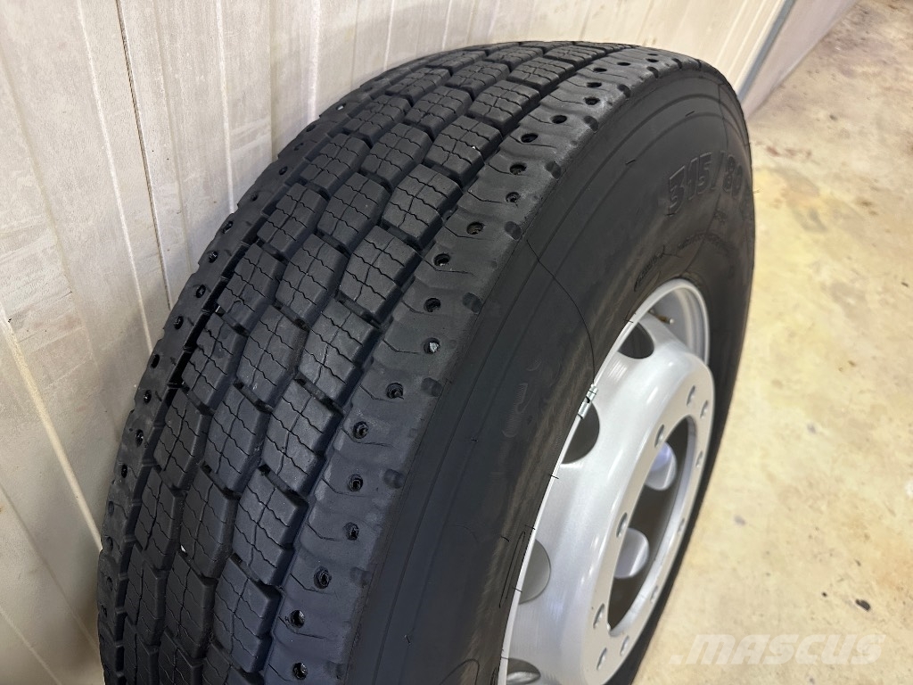 Michelin XFN2+ 315/80 käytetyt eturenkaat uusilla vanteilla Pneumatiky, kolesá a ráfiky