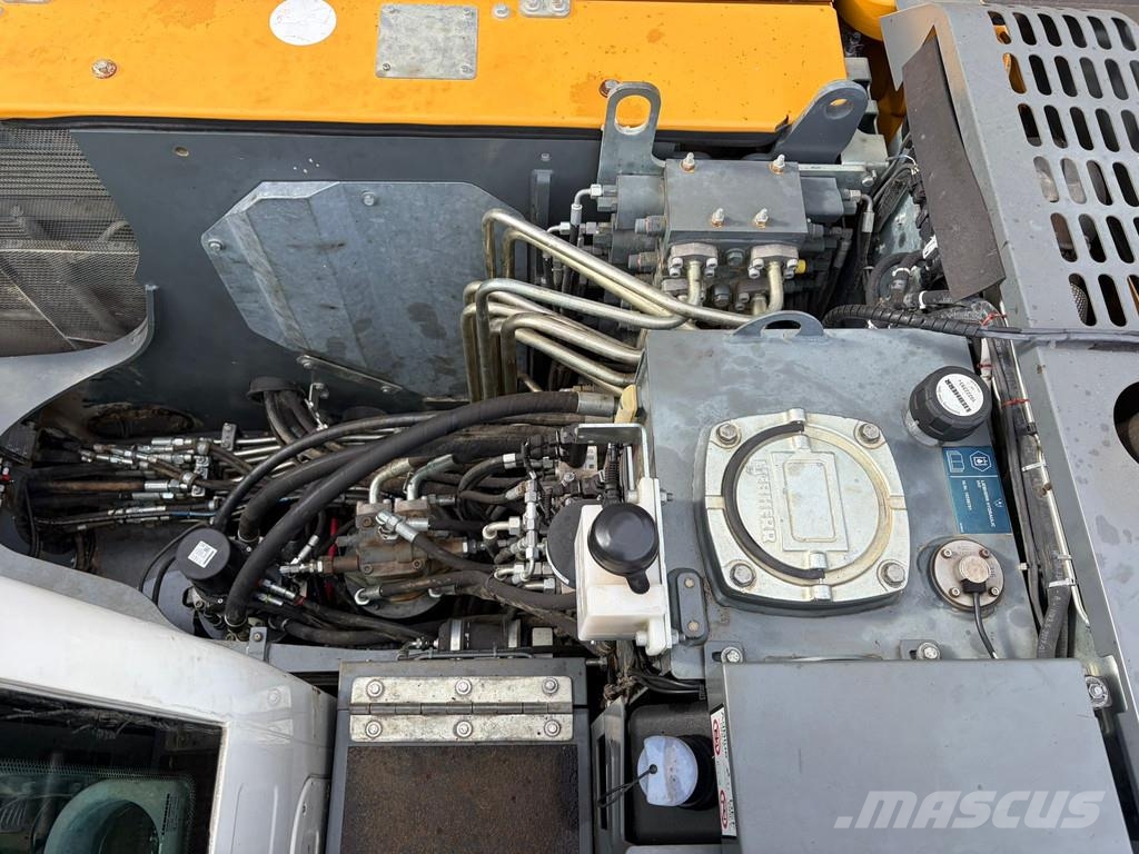 Liebherr A910 Compact Gumikerekes kotrók