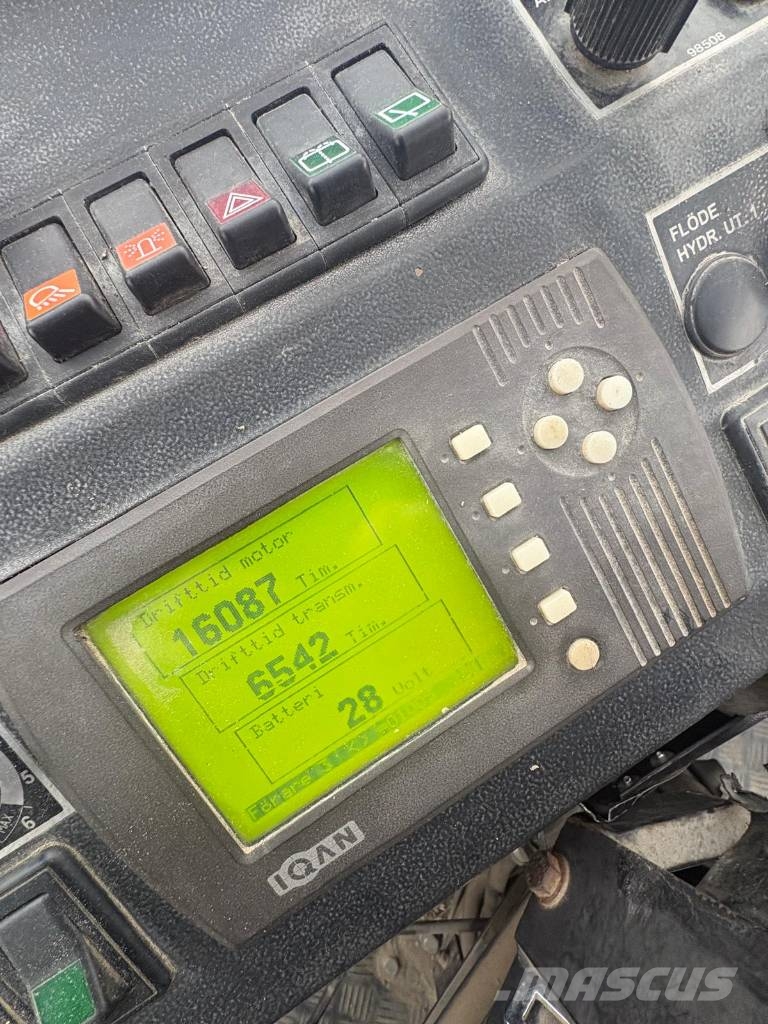 Huddig 960 C6 gårdsmaskin med skördar-aggregat Ekskavaatorlaadurid
