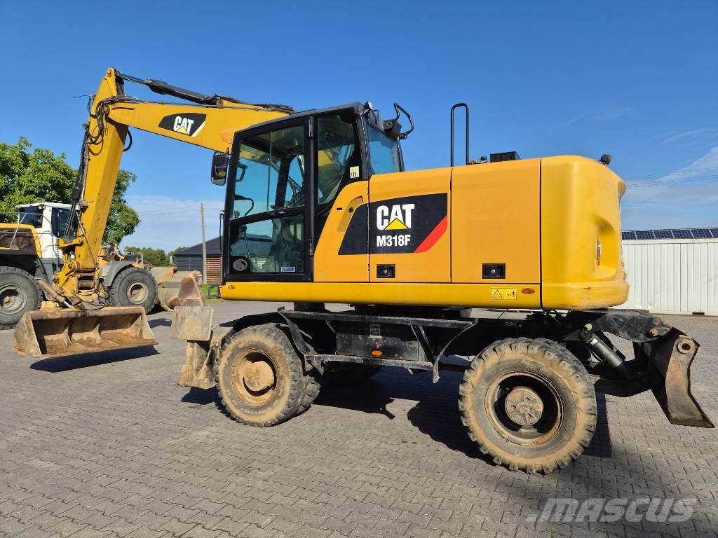 CAT M 318 F Ratiniai ekskavatoriai