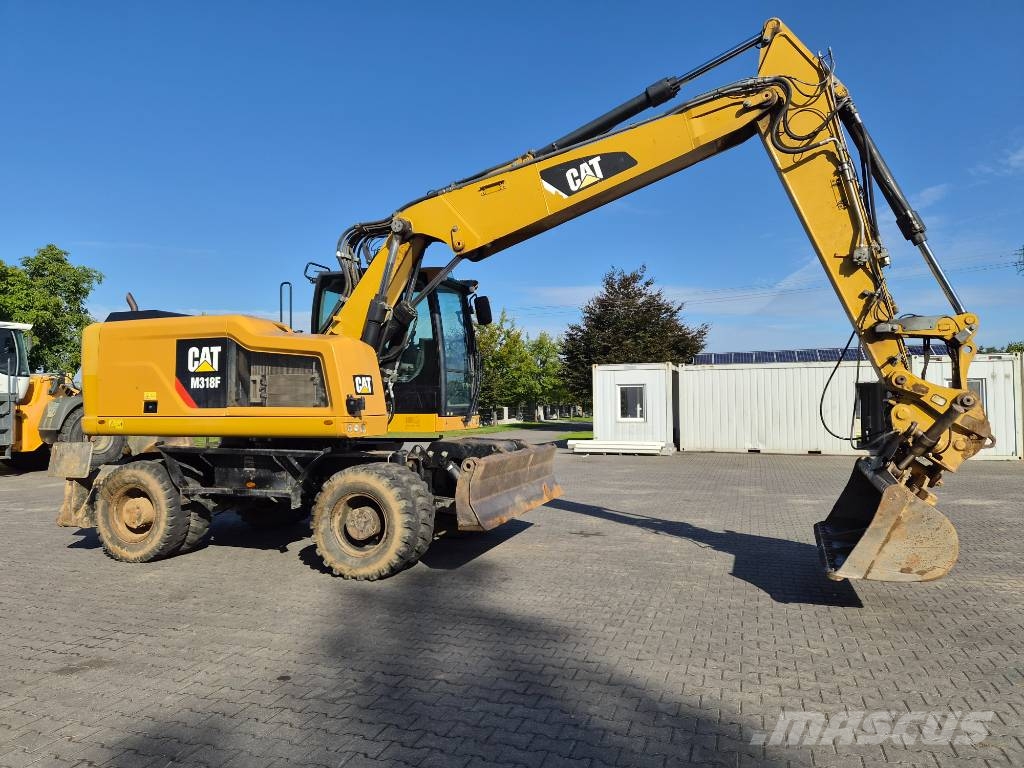 CAT M 318 F Ratiniai ekskavatoriai