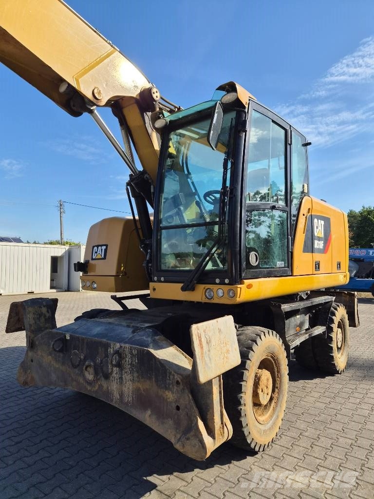 CAT M 318 F Ratiniai ekskavatoriai