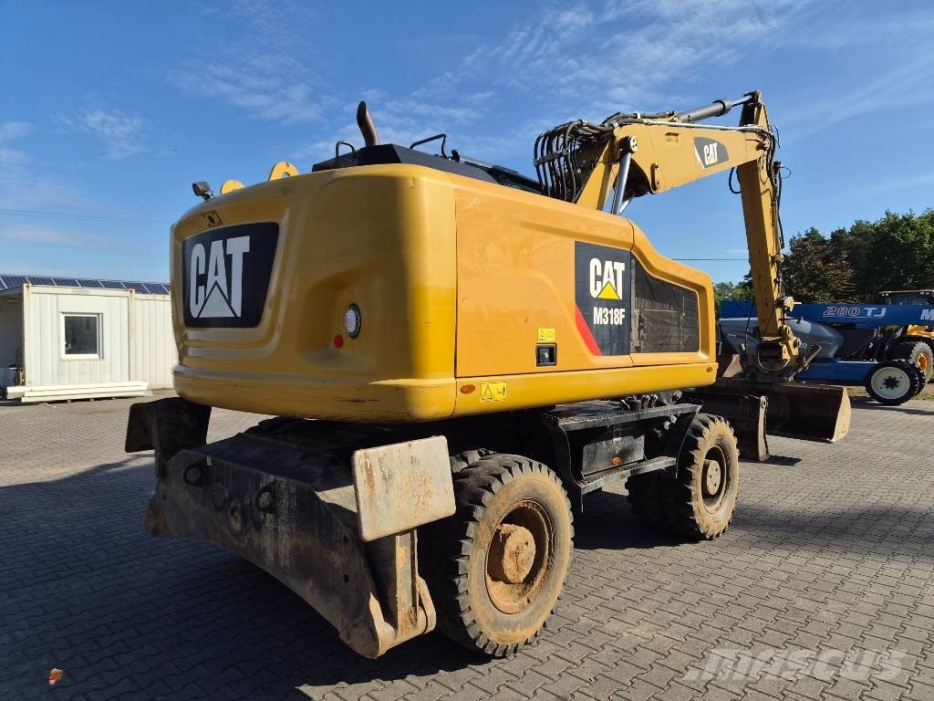 CAT M 318 F Ratiniai ekskavatoriai