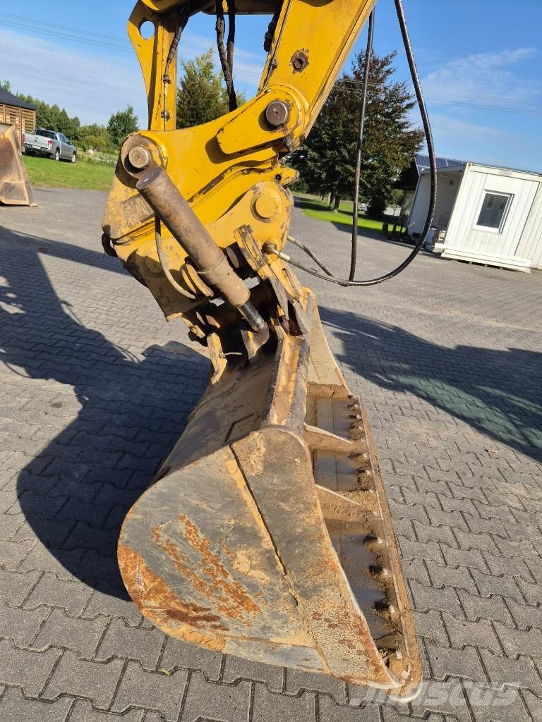 CAT M 318 F Ratiniai ekskavatoriai