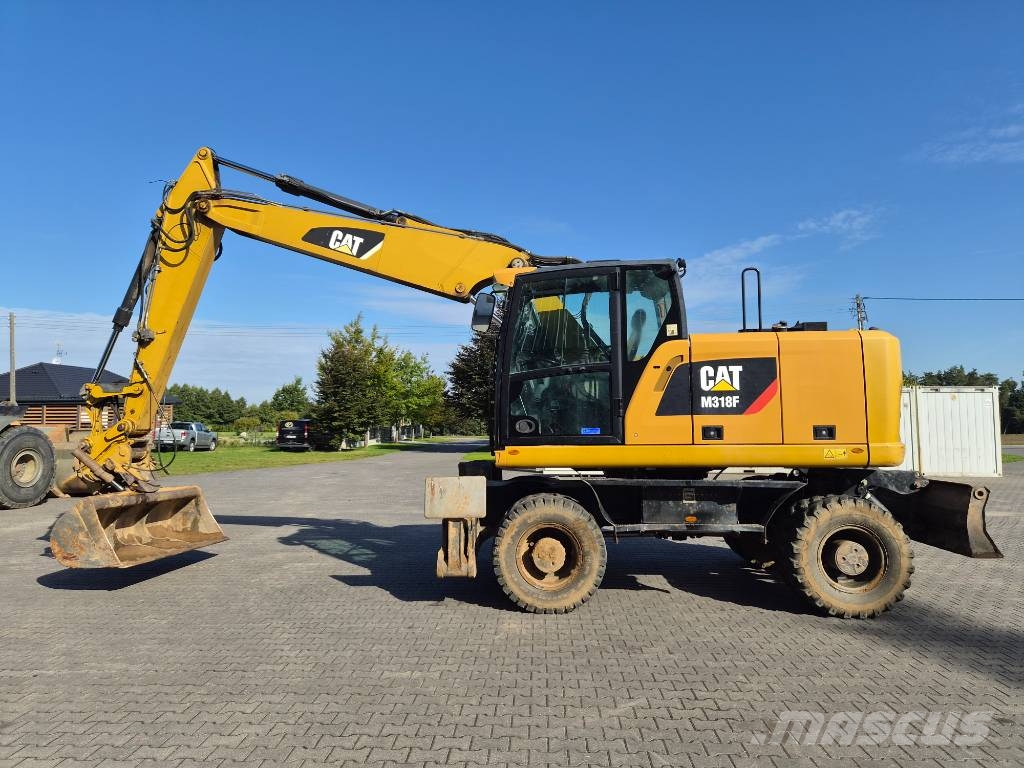 CAT M 318 F Ratiniai ekskavatoriai
