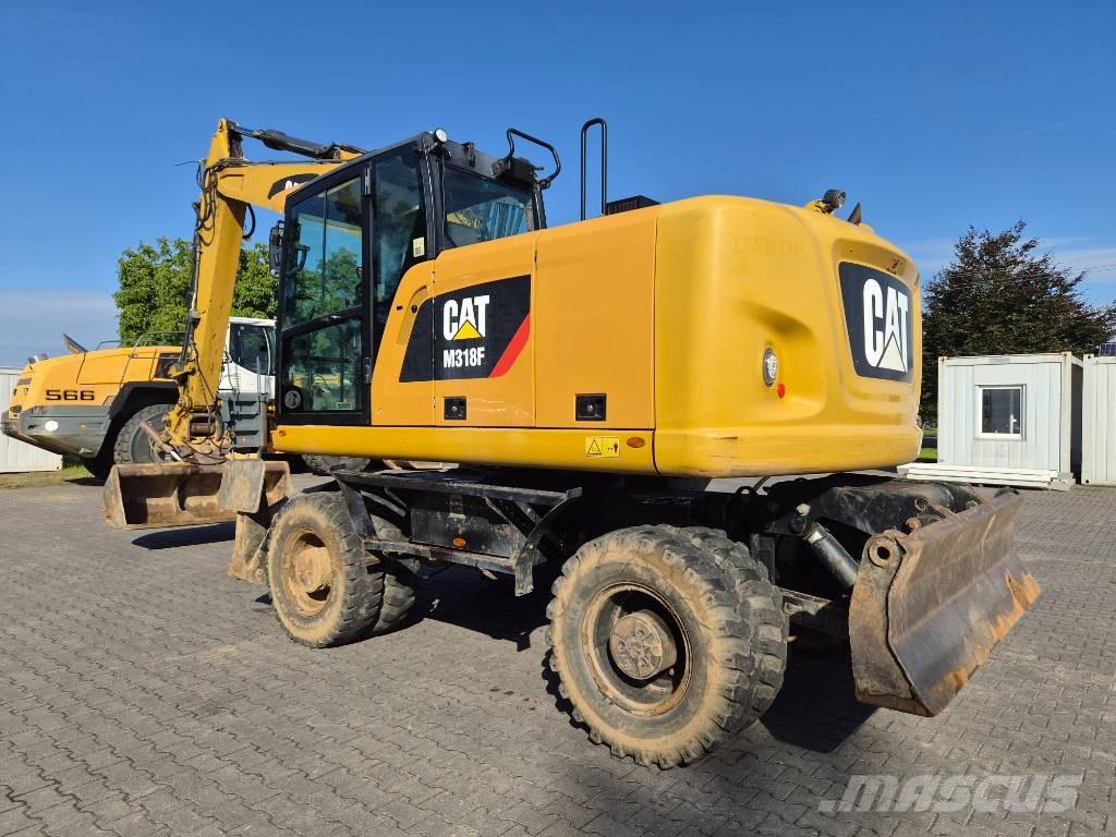 CAT M 318 F Ratiniai ekskavatoriai